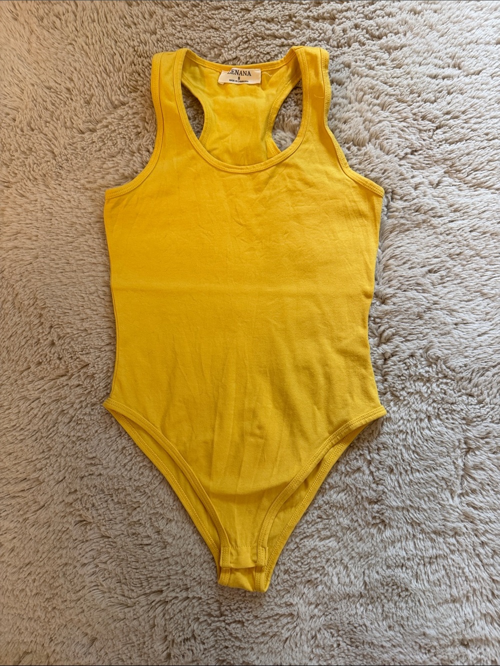 Yellow bodysuit
